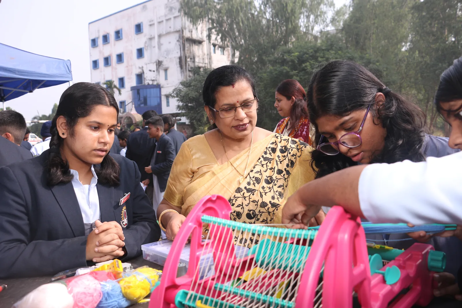 Students conducting mechanics and optics experiments in the physics laboratory