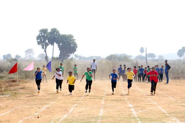 Sports day track, tournament tents and student athletic contingents.